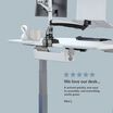 Front view of a electric standing desk with a five star rating with a customer review on the bottom of the image saying "We love our desk... It arrived quickly, was easy to assemble, and everything works great."