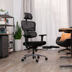 vari comfortflex office chair in black finish used in a home office with footrest shown at an angle