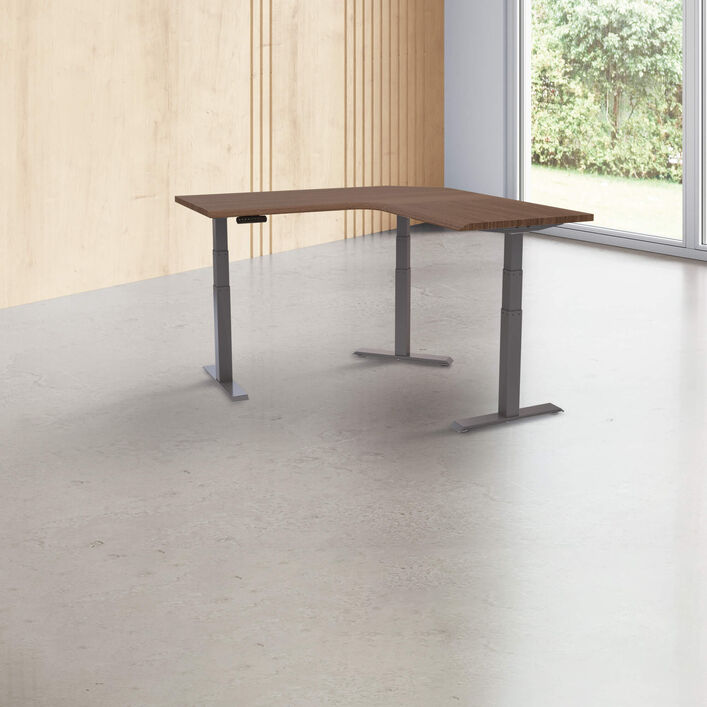 walnut l shape electric standing desk in an open office image number 0
