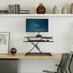 VariDesk Essential Vertical Lift 30 front view in a home office setting