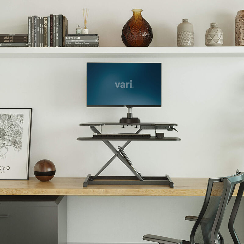 VariDesk Essential Vertical Lift 30 front view in a home office setting. image number null