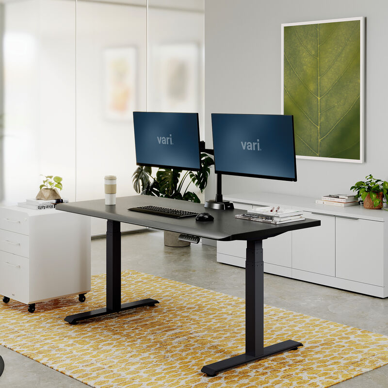 raised black desk in a home office setting image number null