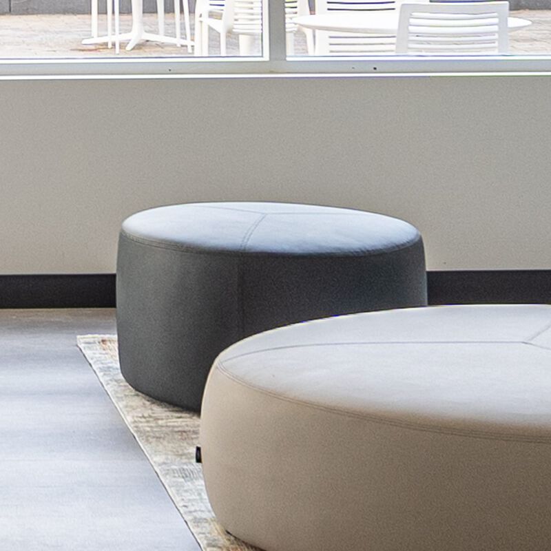 small shadow grey ottoman in lounge setting image number null
