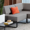 light grey armless seat shown as part of sectional sofa