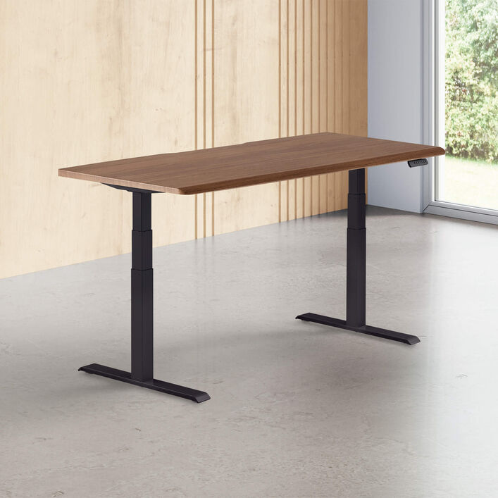 walnut finish standing desk top with black legs in a open office image number 0