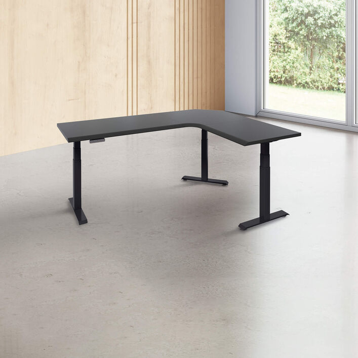 L-shape desk with a black finish desk top with black legs in a open office image number 0