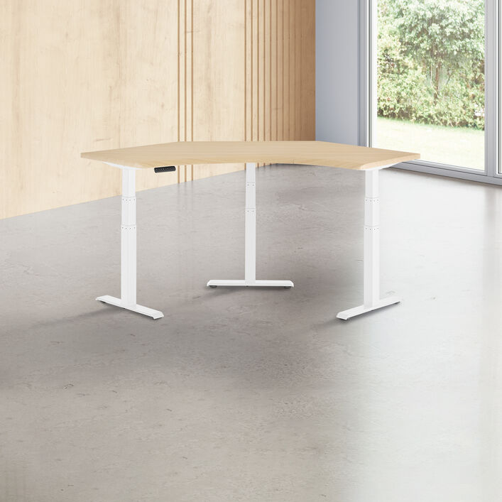 light wood finish standing desk top with white finish legs in a open office image number 0