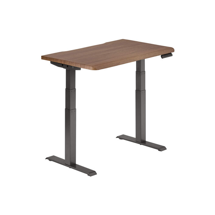 isolated image of a electric standing desk with a walnut finish top and slate legs image number 1