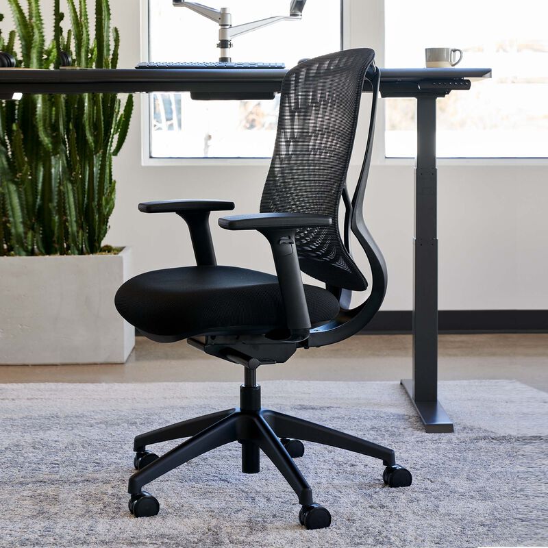 side view of performance task chair in office setting image number null