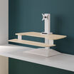 varidesk electric single monitor converter in light wood in a raised position