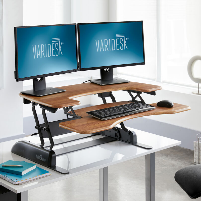VariDesk Pro Plus 36 Butcher Block sit-stand desk converter in raised position in office  image number null