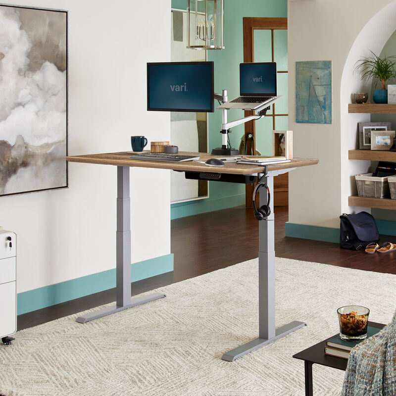 Electric Standing Desk 60x30 reclaimed wood in raised position at home image number null