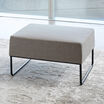 light grey ottoman in office setting