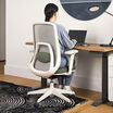 vari ascent chair in eucalyptus in home office setting with professional sitting