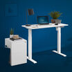 Essential electric standing desk 48 by 24 and an essential file cabinet in white are shown on a blue background