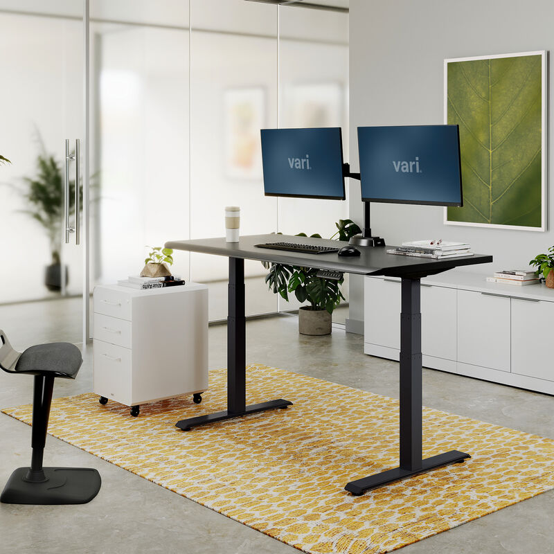 lowered black desk in a home office setting image number null