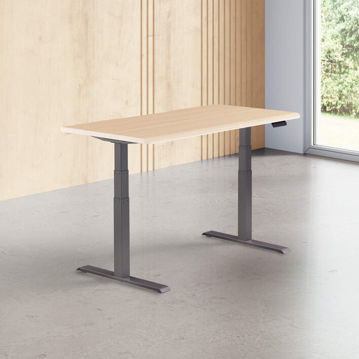 light wood finish standing desk top with slate legs in a open office image number 0