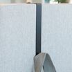 quickflex cubes hook accessory in black on a wall panel holding a handbag