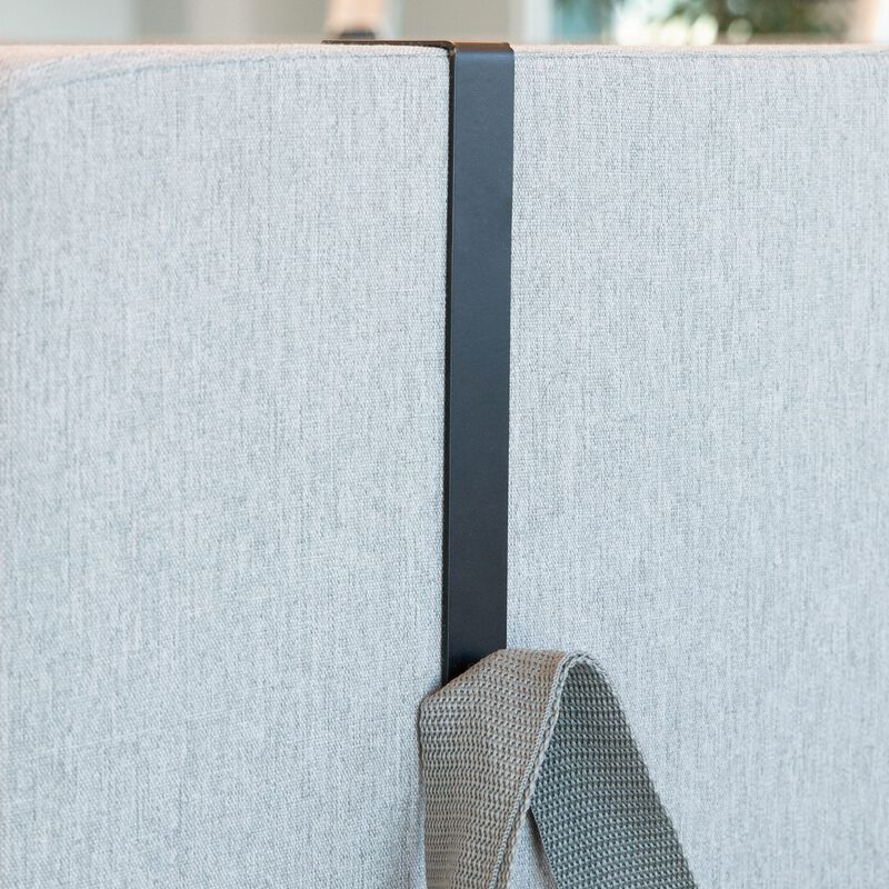 quickflex cubes hook accessory in black on a wall panel holding a handbag image number null