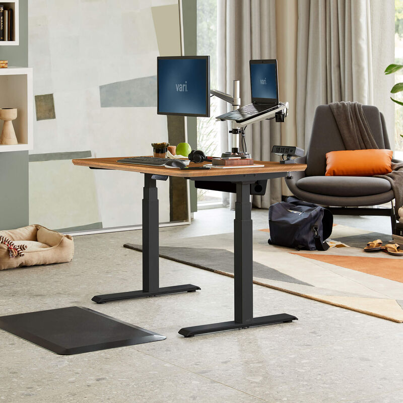 Electric Standing Desk 48x30 Butcher Block in raised position at home image number null