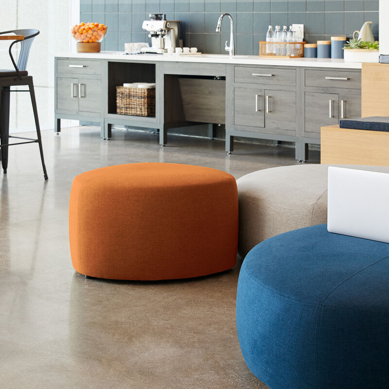 small burnt orange ottoman in lounge setting image number null