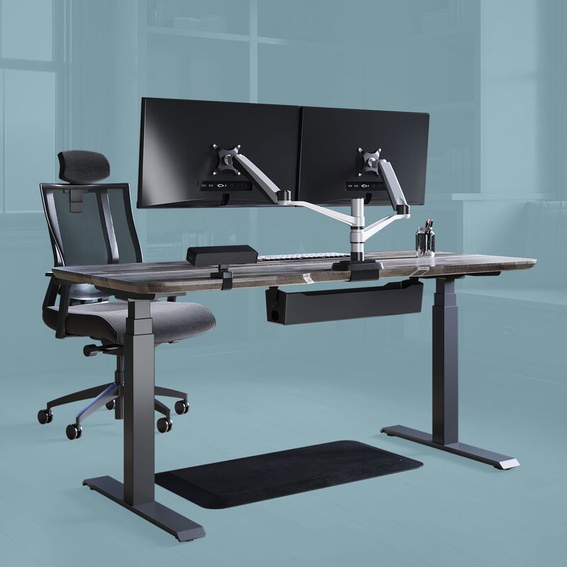 Sit stand executive workspace bundle comprised of electric standing desk 72 by 30, standing mat 36 by 24, dual monitor arm, power hub, cable tray and task chair with headrest.  image number null