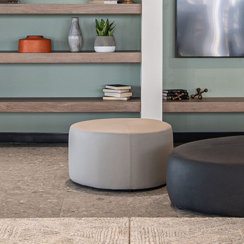 small sand grey ottoman in lounge setting image number null