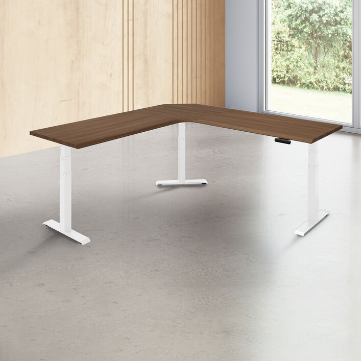 L-shape desk with a walnut finish desk top with white legs in a open office image number 0