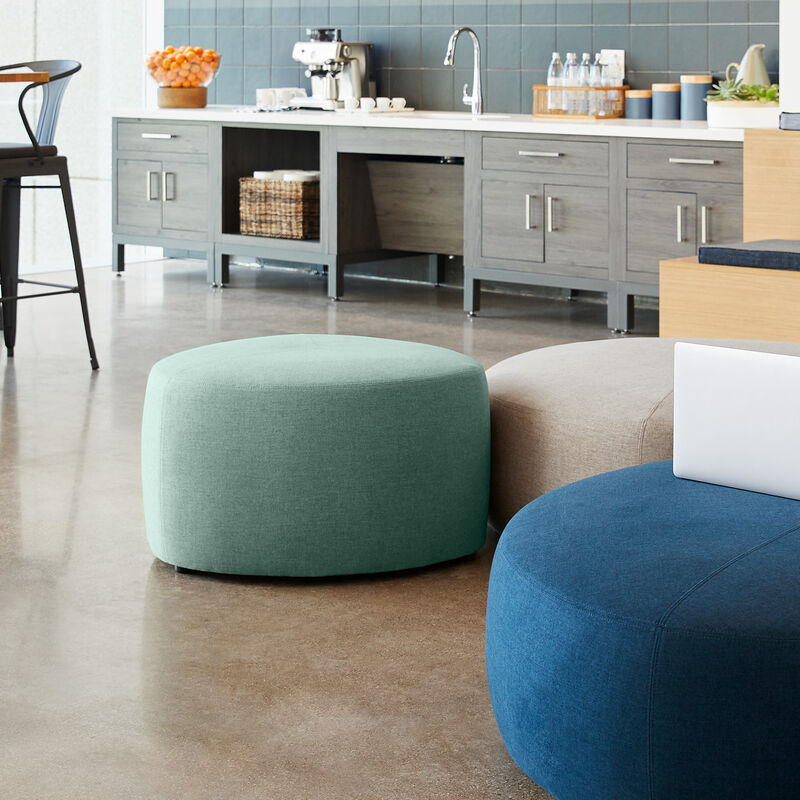 small aqua green ottoman in lounge setting image number null