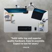 Overhead view of standing desk with a quote at the bottom of the image saying "Solid table-top and superior quality hardware. Easy to assemble. Expect to last for years."