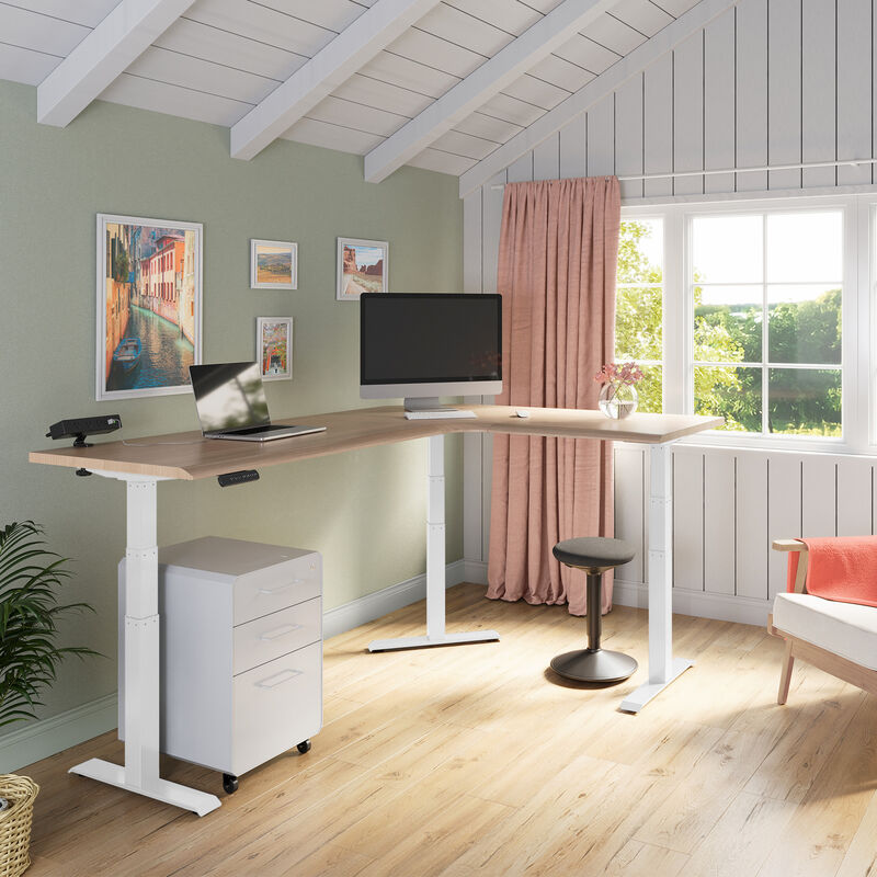 light wood finish l shape electric standing desk with white legs in a raised position  image number null