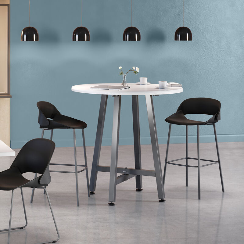 two tall wave side chairs around a tall round table in a cafe area image number null