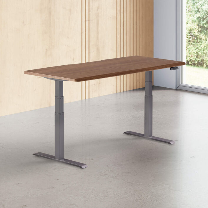 walnut finish standing desk top with slate legs in a open office image number 0