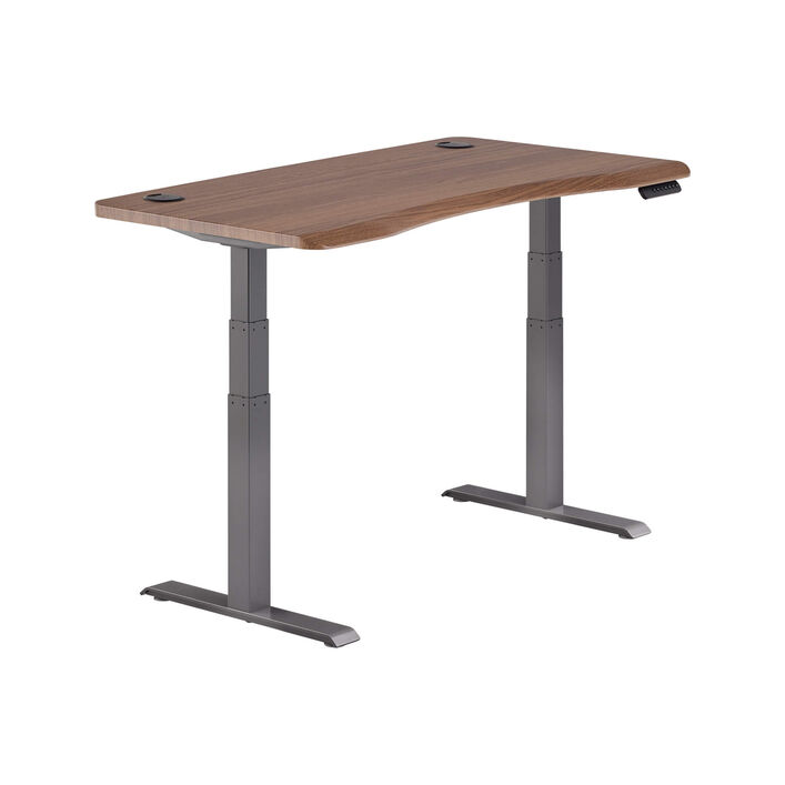 isolated image of a electric standing desk with a walnut finish top and slate legs image number 1