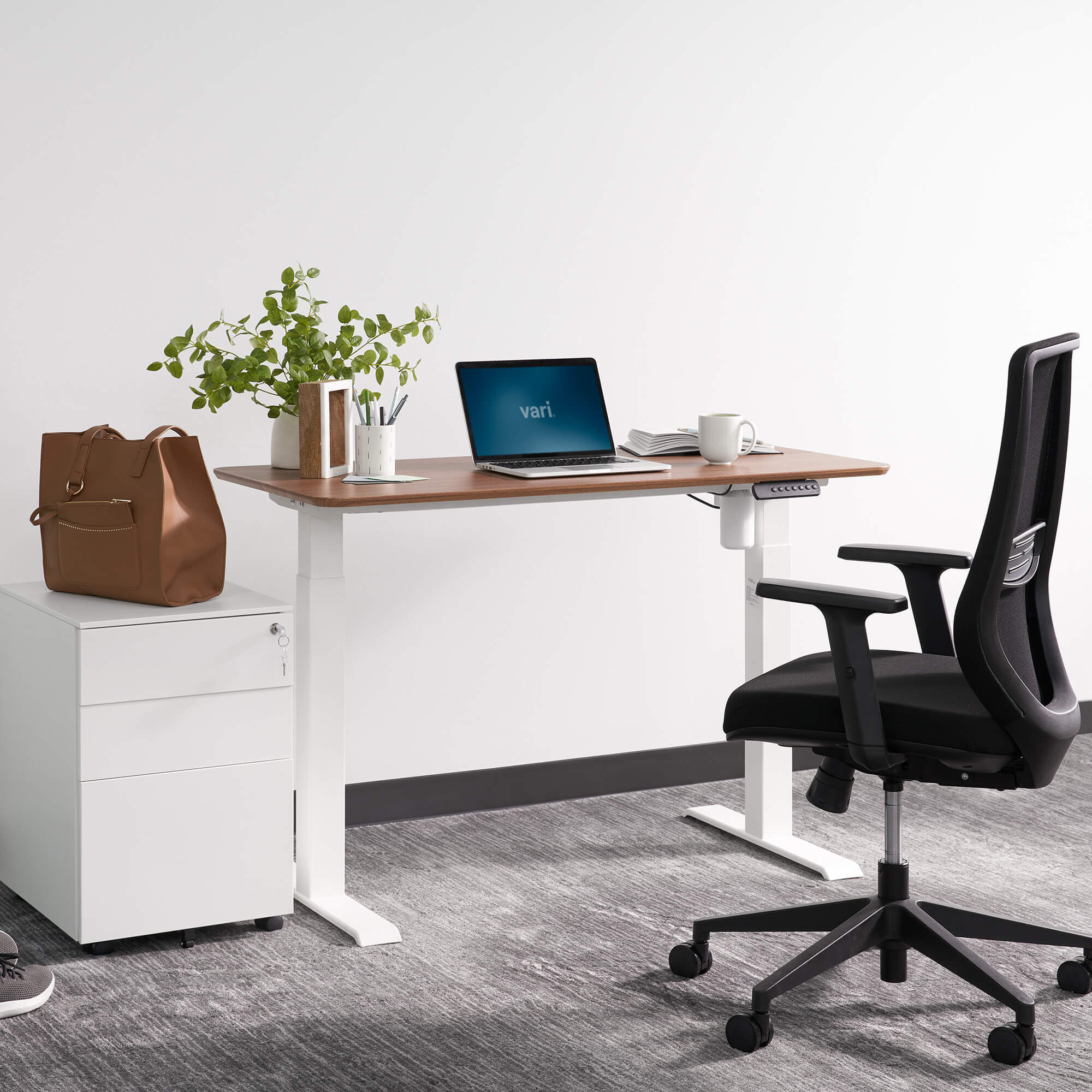 Split top electric stand up outlet desk
