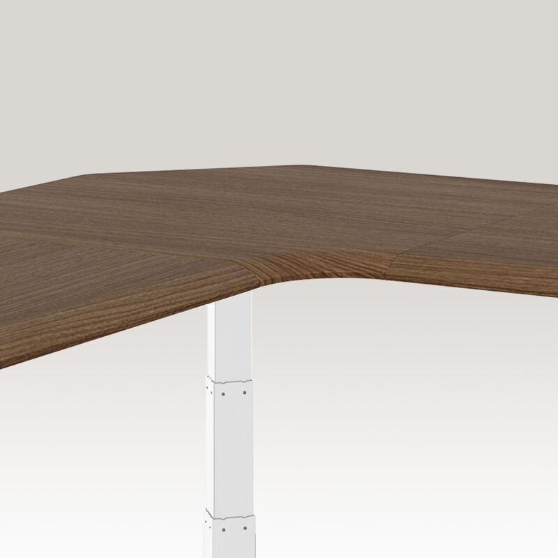 eye level view of the corner on an l shape electric standing desk image number null