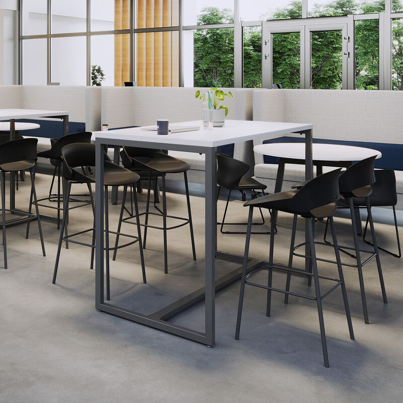 standing work table in white finish setup in an open meeting environment with four tall chairs image number null