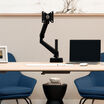 showing single monitor arm without a monitor attached