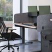 desk surround attached to a standing desk