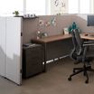 quickflex cubes top shelf accessory in black on top of a wall panel in a workspace