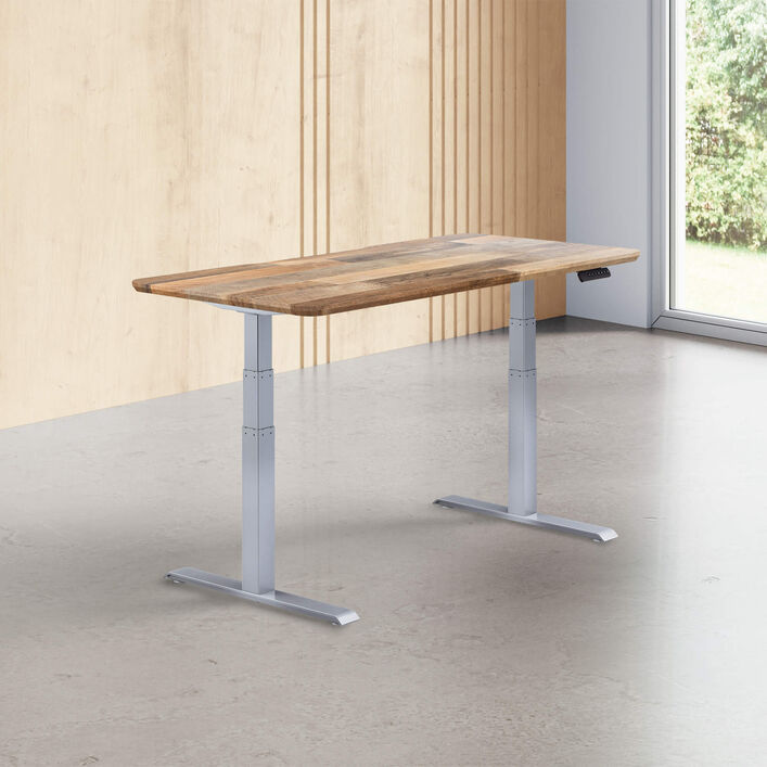 reclaimed wood finish standing desk top with silver legs in a open office image number 0