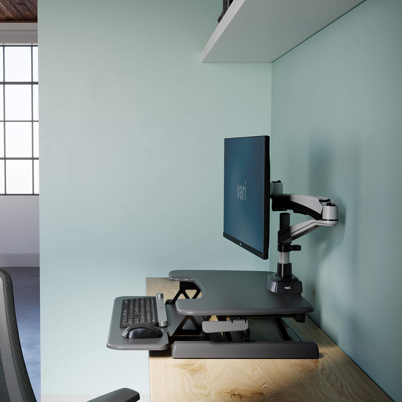 Varidesk Essential Vertical Lift 30 side view in the lowered position.  image number null