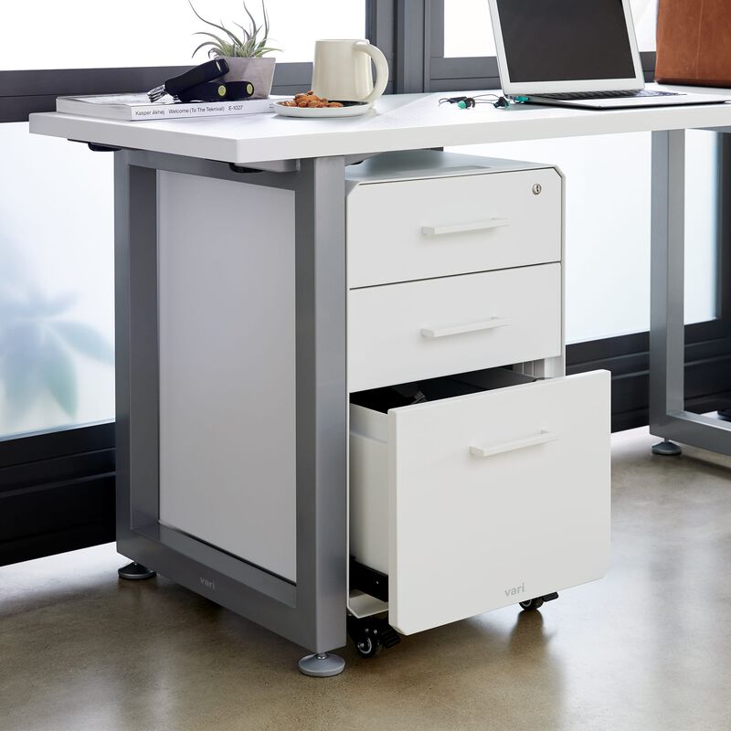 File Cabinet White under desk with bottom drawer open image number null
