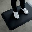 Standing Mat 36x24 Black in office with person standing on it