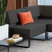 deep grey armless seat shown as part as sectional sofa