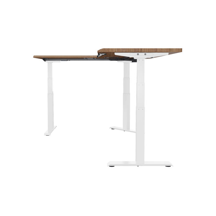 side view of an l shape electric standing desk with a walnut finish top and white legs image number 2