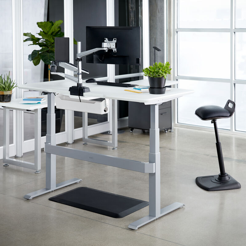 electric standing desk 60x30 discontinued in white with silver legs raised at an office image number null