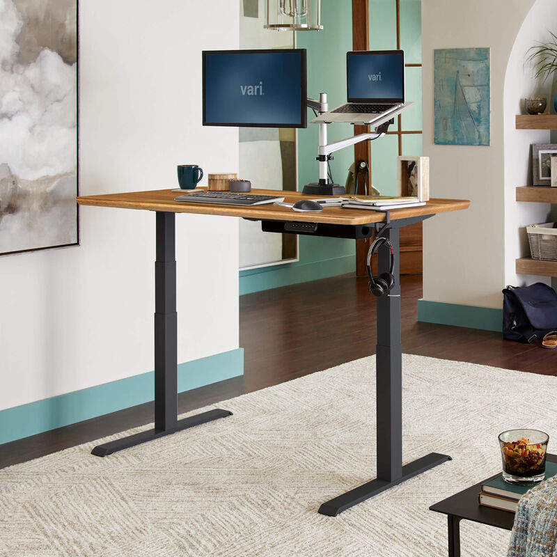 Electric Standing Desk 60x30 Butcher Block in raised position at home image number null
