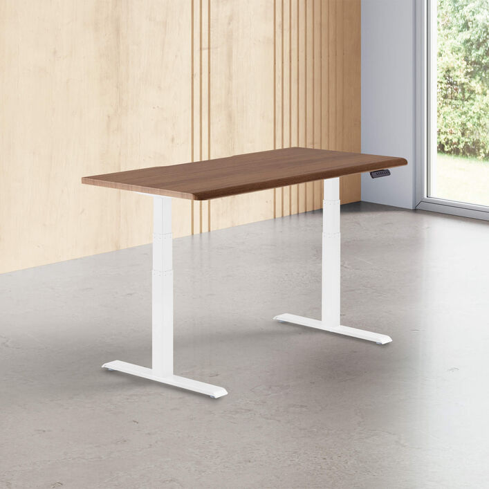 walnut finish standing desk top with white legs in a open office image number 0