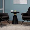 pedestal side table in black in office setting